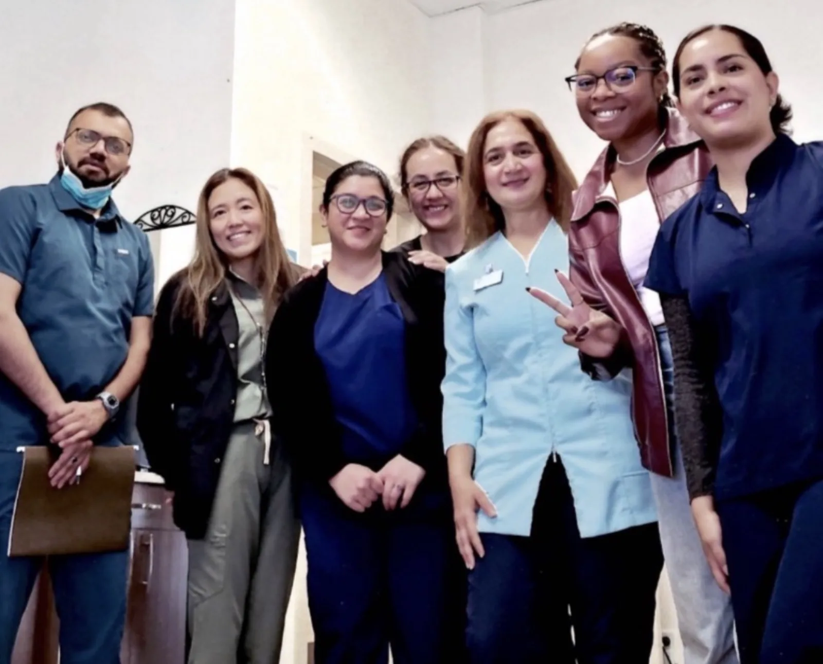 The front desk and clinical team at Power Smile Dental Centre in South Surrey